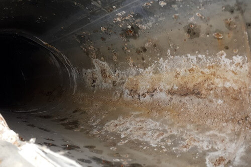 Subterranean air supply duct with corrosion