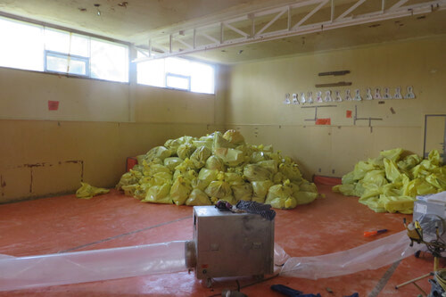 Temporary storage of asbestos waste during removal